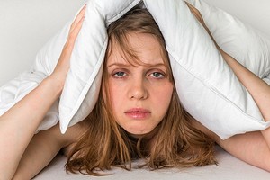 От депрессии до пищевой аллергии: почему болит голова после сна